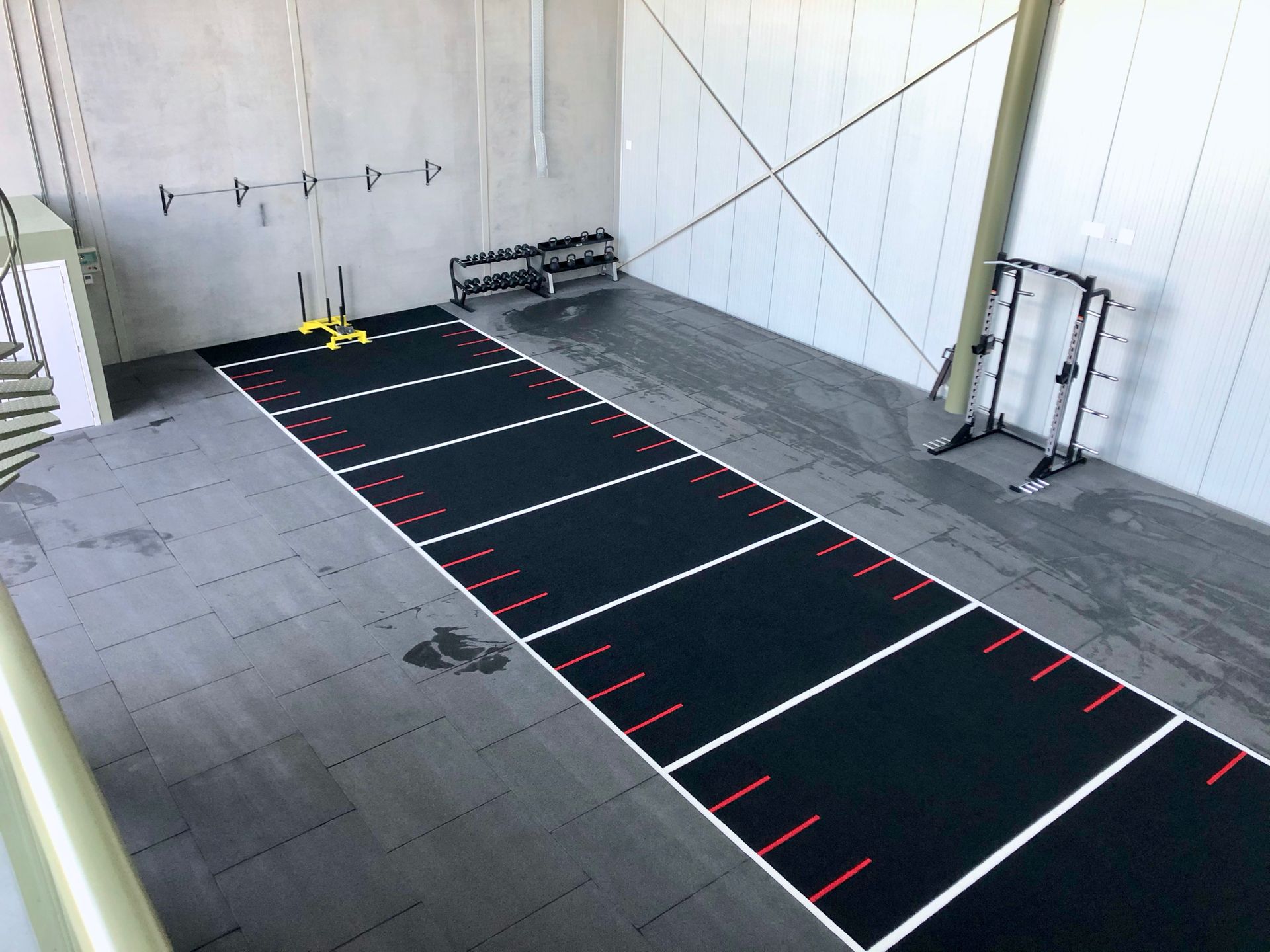 Black mat with red lines in gym